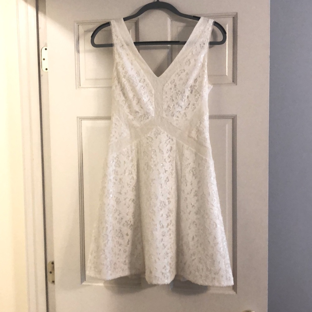 BCBG Maxazria white sequin mini dress.